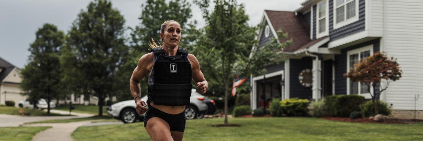 Woman Running in a Weighted Vest
