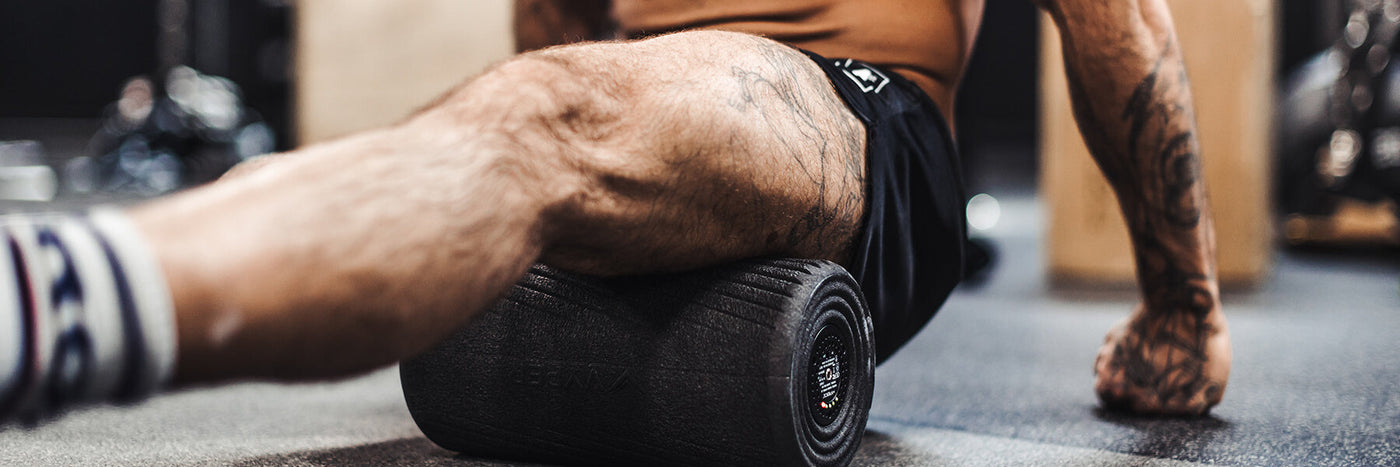 Man Foam Rolling His Hamstrings