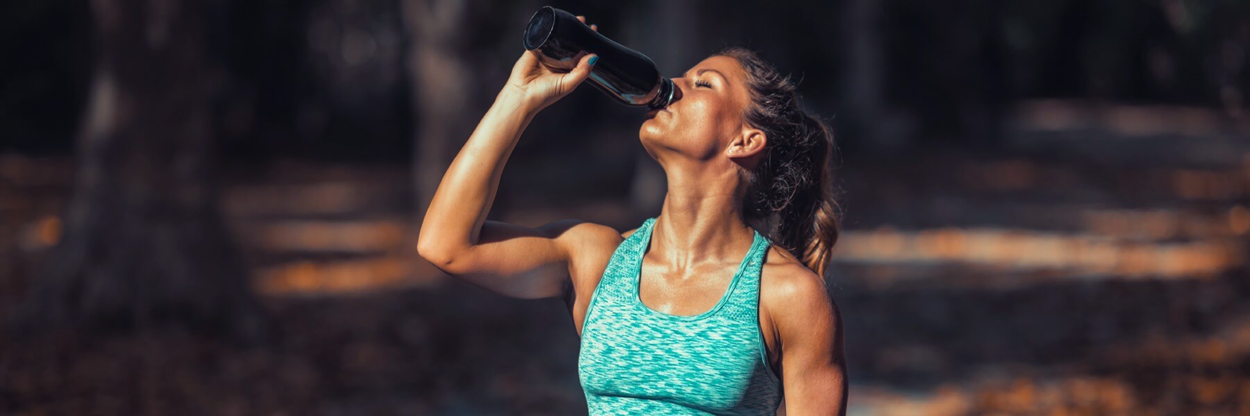 Woman Drinking From a Shaker Cup
